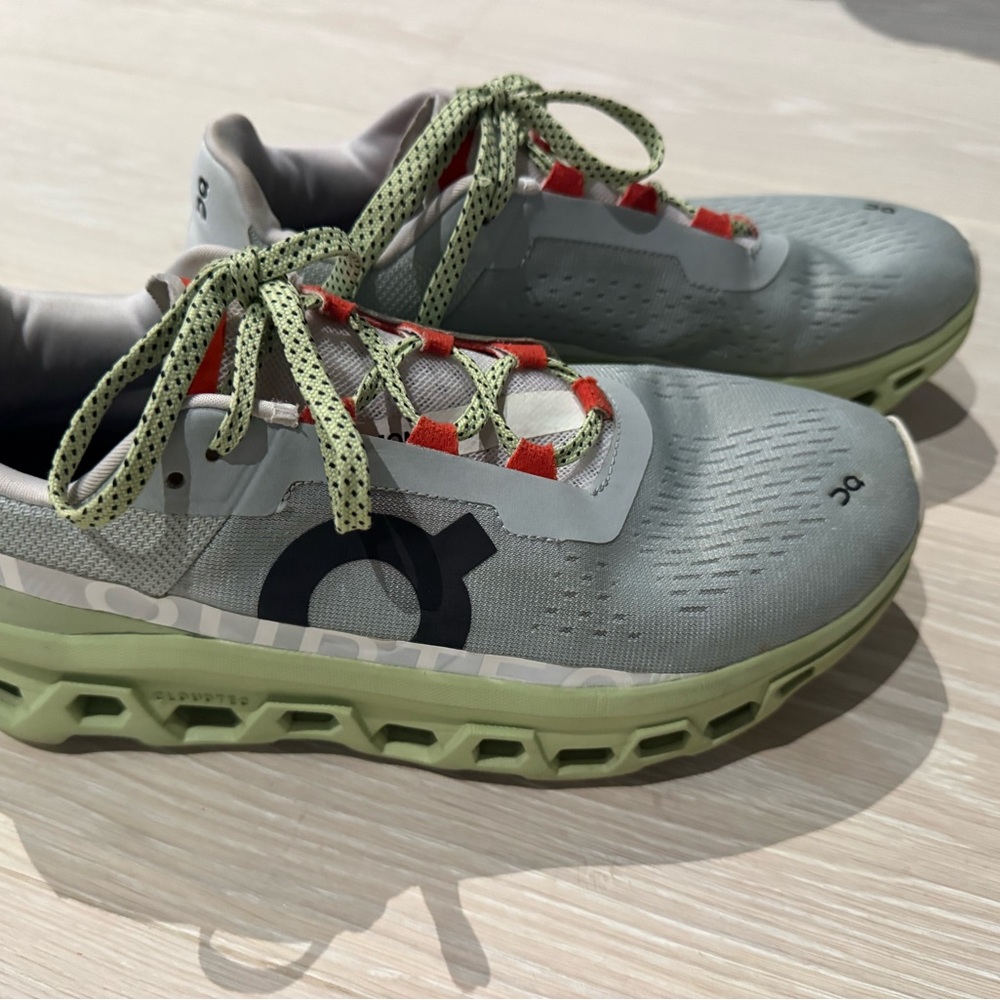 On Running Sneakers in Green and orange